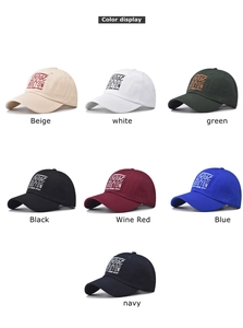 Detail of Boston embroidery on premium cotton baseball caps in seven assorted colors