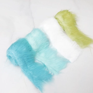 Faux fur fabric trim in blue, white, and lime green for DIY Christmas decor