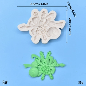 Detail of pinecone and candle silicone mold for Christmas soap and fondant DIY crafts