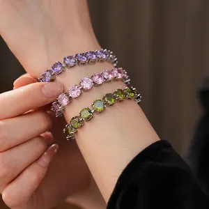 Three luxury tennis bracelets with purple, pink and olive green round zircon stones