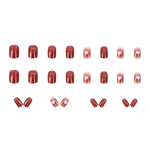 Glossy red gradient press-on nails with white heart patterns in short square-oval shape