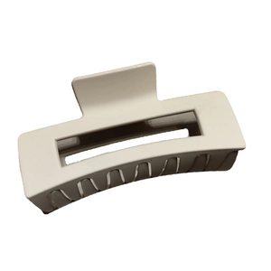 Elegant large matte cream hair claw clip with rectangular hollow design for back of head