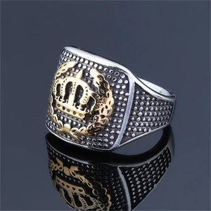 Vintage stainless steel crown ring with gold embossed detail and beaded texture