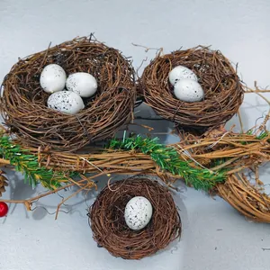 Artificial rattan bird nest set with speckled eggs, pine needles and red berries
