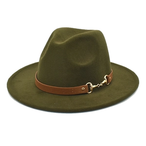 Detail of olive green wool fedora featuring a leather band and gold horsebit buckle
