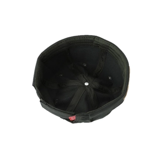 Dark green miki hat for kids featuring reinforced internal structure and red cute label