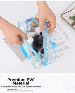 Waterproof PVC toiletry bag with large opening for skincare storage and blue zipper detail