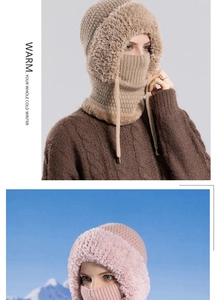 Detail of warm khaki and pink knit hat with integrated fleece mask for outdoor protection