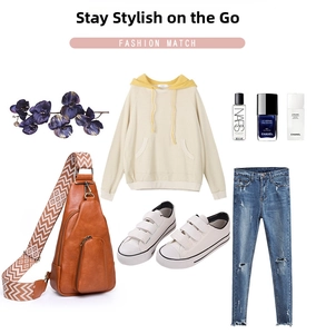 Flat lay of vintage brown PU crossbody bag paired with beige hoodie and ripped blue jeans