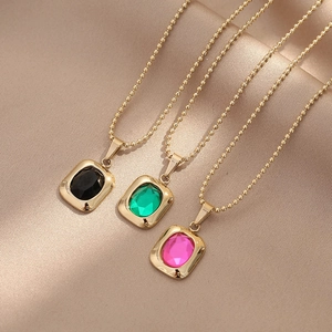 Luxe crystal pendant necklaces in black, green and pink with golden bead chains