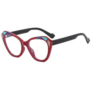 Cat eye blue light blocking glasses with red frame and colorful geometric accents