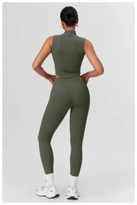 Rear view of high-waisted olive green yoga leggings with seamless fitness compression