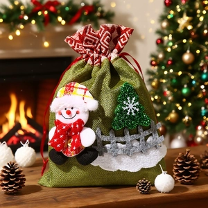 Christmas snowman drawstring gift bag made of green burlap with 3D fence decorations