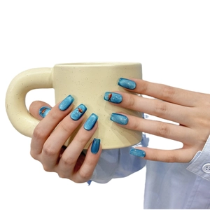Blue cat eye press-on nails with 3D water drops and delicate small fish patterns