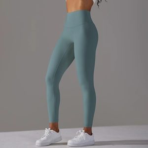 Detailed side view of high-waisted seamless yoga leggings in matte dusty blue finish