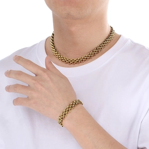 Close-up of men wearing gold-toned triple-row woven chain necklace and bracelet set