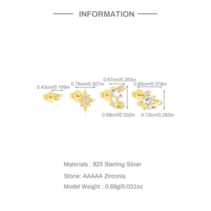 Detail view of S925 sterling silver star and planet stud earrings set with zircon
