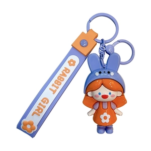 Cute cartoon rabbit girl keychain with soft orange PVC doll and purple strap pendant