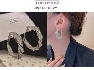 Close-up and model view of 4cm silver twist hoop earrings with shimmering crystals