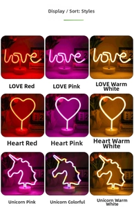Detail showing various LED neon light shapes including Love, Heart and Unicorn on round bases