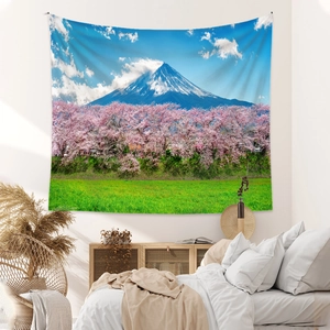 Detailed view of Mt Fuji landscape tapestry hanging in a minimalist bedroom setting