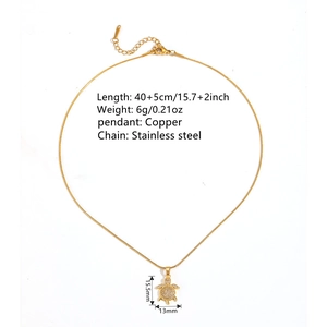 Golden turtle pendant necklace in stainless steel with sparkling crystals and a thin chain