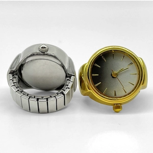 Detailed view of gold and silver ring watches with elastic stainless steel bands