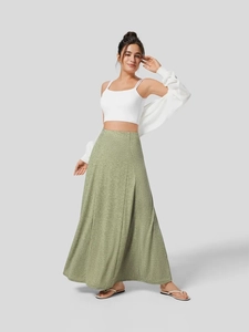 Women stylish moss green knitted long skirt with white camisole and cardigan set