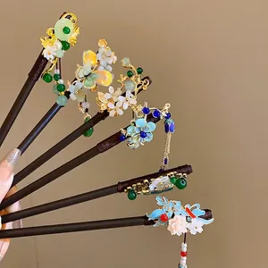 Set of six Chinese butterfly and flower hairpins with tassels in various vibrant colors