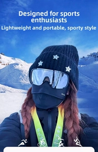 Outdoor skiing set featuring black knit beanie, mirrored goggles and thermal face mask