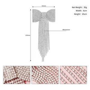 Detailed view of luxury rhinestone bow hairpin with 6cm width and 15cm height dimensions
