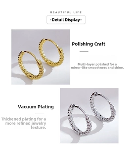 Polished twist hoop earrings with vacuum plating for a mirror-like golden and silver finish