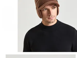 Détail du bonnet en tricot marron pour homme avec protège-oreilles et doublure polaire