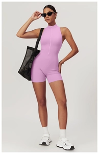 Detailed view of lavender sleeveless yoga jumpsuit featuring a half-zip neckline design