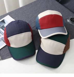 Top view of three multi-color vintage baseball caps with five-panel camping structure