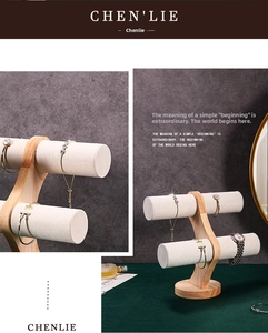 Detail of double-layer solid wood jewelry stand with soft velvet bracelet rollers