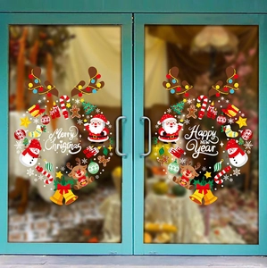 Festive Christmas and New Year PVC static stickers applied to glass doors