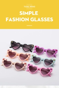 Detail view of heart-shaped kids sunglasses with floral accents in six vibrant colors