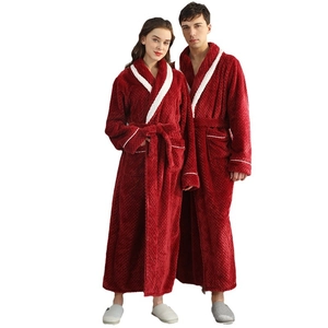 Thick dark red long couple bathrobe in soft flannel featuring white trim and waist belt