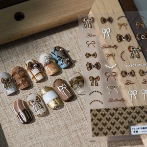 5D brown bow and pearl nail art stickers with vintage plaid and gold foil designs