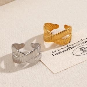 Crossed X design geometric rings with vertical texture in gold and silver finish