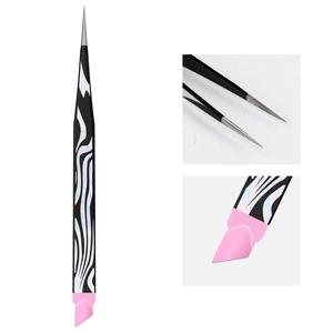 Detail of black zebra pattern stainless steel nail tweezers with pink silicone press tool
