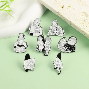 Set of 7 cartoon black and white enamel pins featuring girl and cat interaction designs