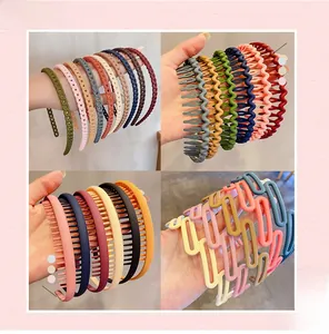 Detail of matte Morandi headbands with wavy, braided, and geometric openwork textures