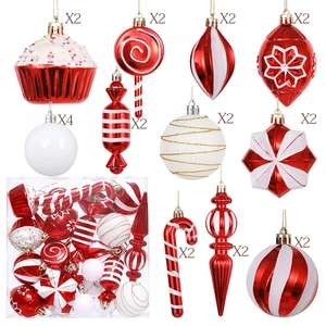 Red and white Christmas ornament set including candy canes, cupcakes, and festive balls