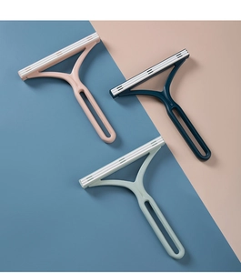 Set di tre levapelucchi manuali in rosa, blu scuro e verde per la cura dei propri tessuti