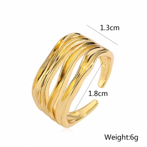 Detail shot of golden irregular wave ring showing width 1.3cm and inner diameter 1.8cm