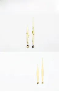 Detail of gold metal clock hands model 949 with diamond sword design and polished finish