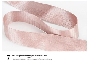 Detail of pink satin webbing strap with smooth texture and subtle glossy finish