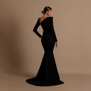 Elegant black long sleeve mermaid evening gown featuring slim fit and hollowed back design